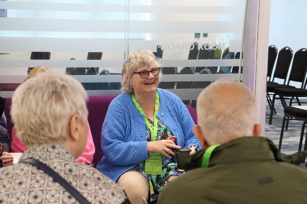 Image of tenants talking at last years AGM