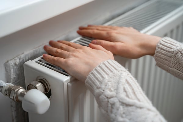 close-up-hands-heater