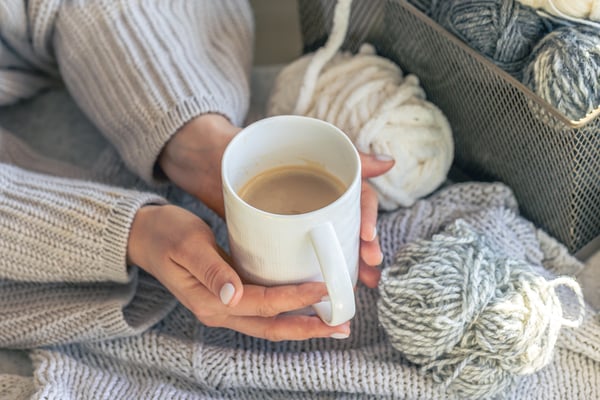 cup-coffee-female-hands-thread-yarn