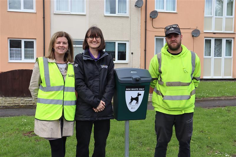 Image of the teams installing the bin 