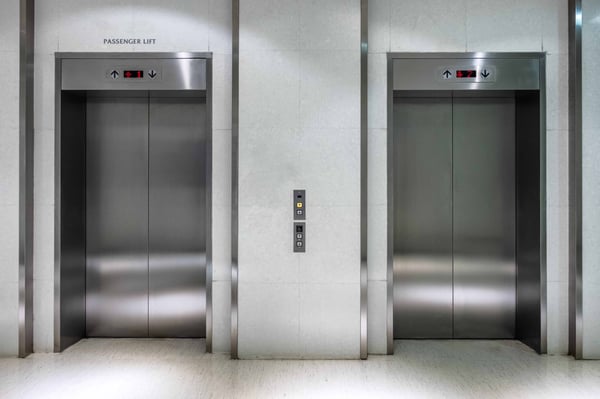 metallic-elevator-two-gate-closed-passenger-lift