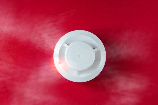 smoke-detector-fire-detector-red-background